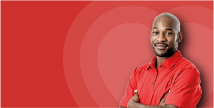 Man smiling infront of red background